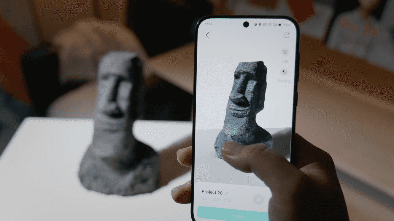 KIRI Engine Basic plan — scanning a Moai figurine with Photo Scan on Android smartphone, showing 3D model preview on screen